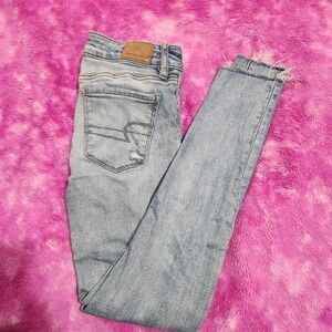 American Eagle Women's Super Stretch Jeggings Distressed Raw Hem Size 00 Regular